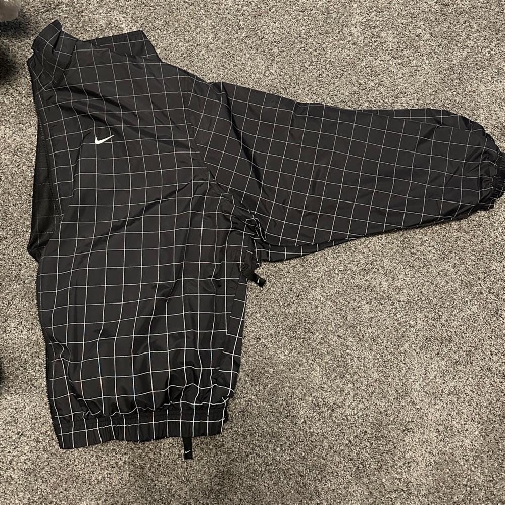 Black patterned Nike zip
